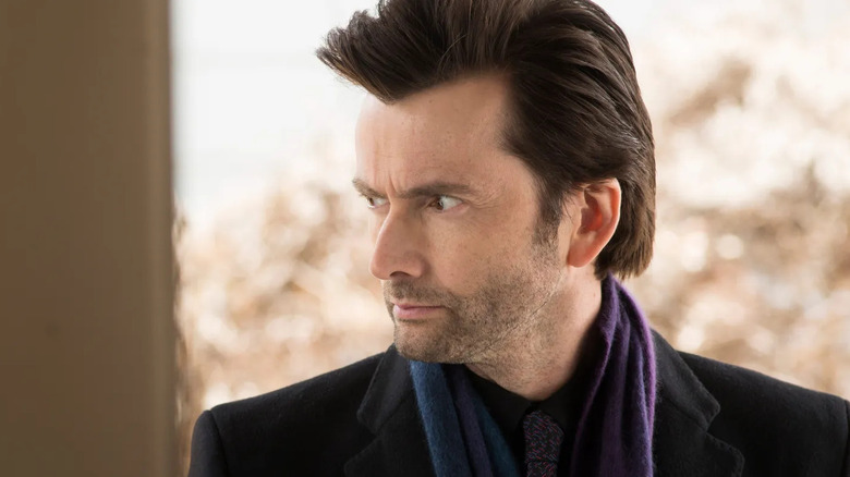Kilgrave looks over his shoulder worried in Jessica Jones