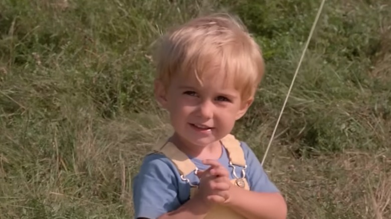 Gage clasping his hands