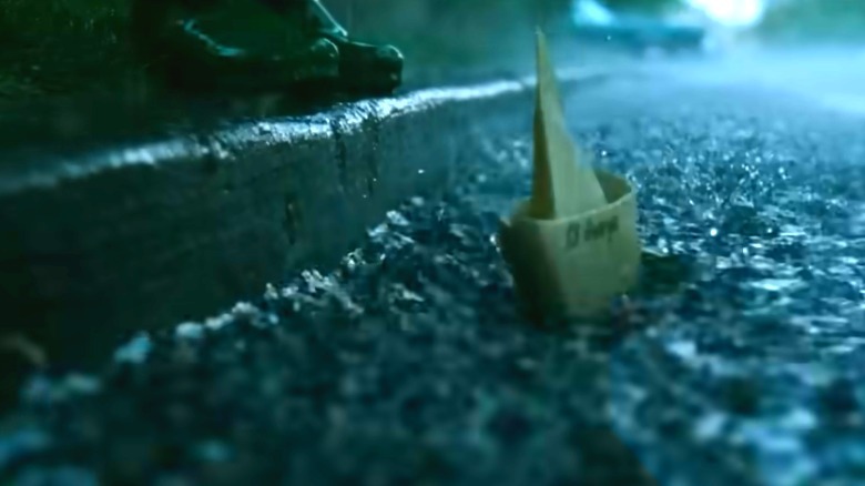 Georgie's boat floating toward the sewer