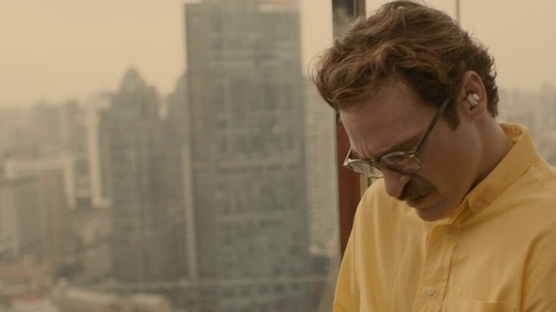 Joaquin Phoenix reflection window