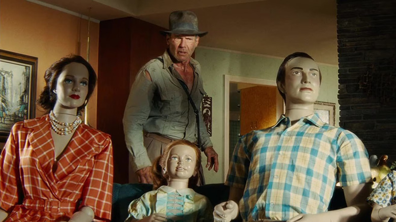 Harrison Ford as Indiana Jones noticing a dummy family in Kingdom of the Crystal Skull (2008)