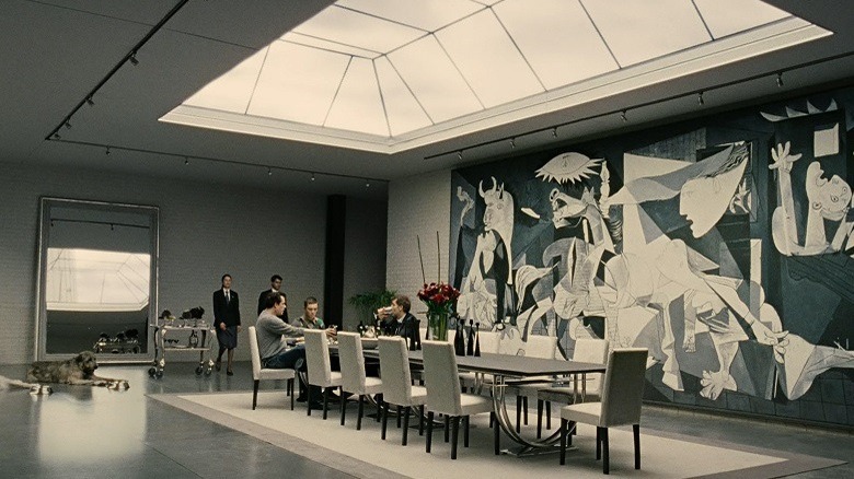 Theo with his brother in a huge dining room