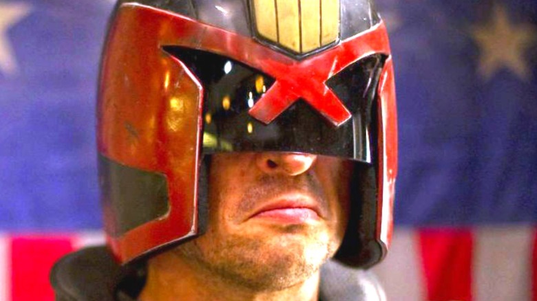 Dredd scowling in helmet