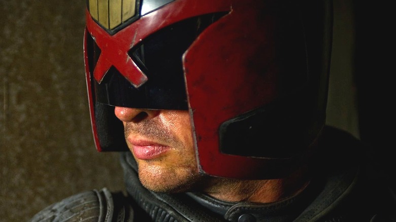 Dredd scowling in helmet