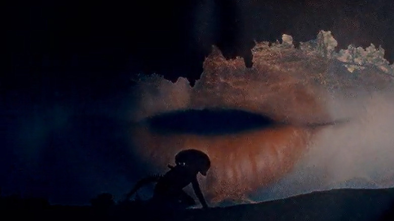 The Xenomorph against a background of Wendy's lips in Alien: Earth season 1