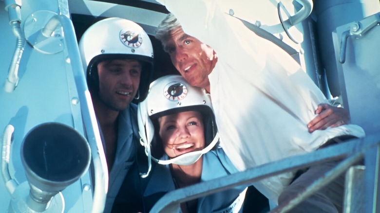 Andy Griffith's Harry poses with his team inside the rocket ship in Salvage 1