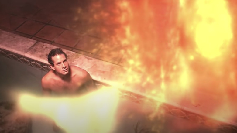Steve Guttenberg in pool staring at light