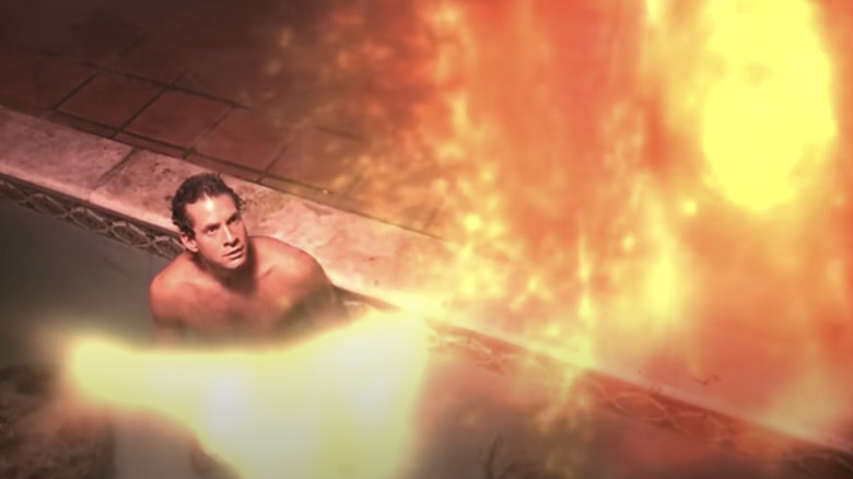 Steve Guttenberg in pool staring at light