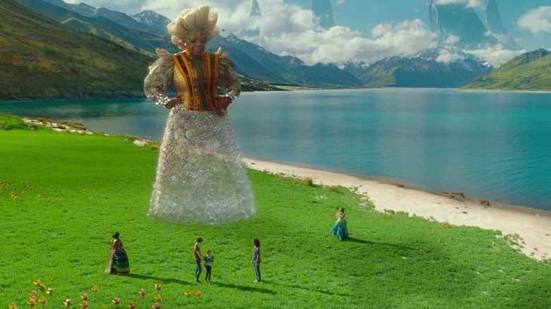 Giant Mrs. Which towering over group in A Wrinkle in Time