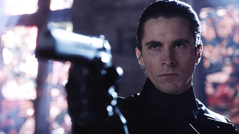 Christian Bale pointing gun in Equilibrium