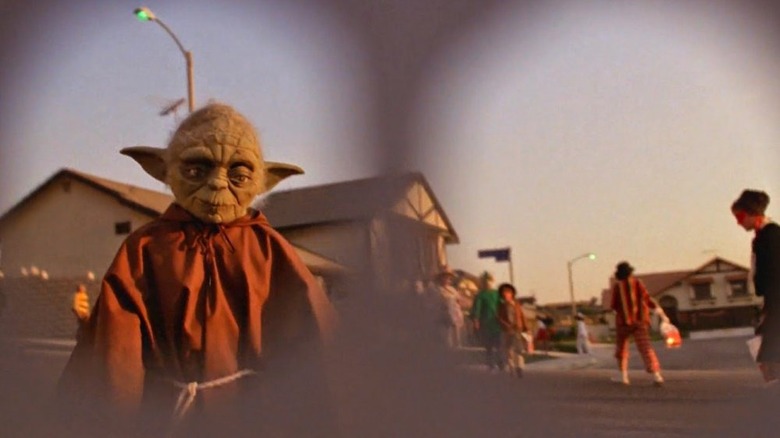 Child dressed as Yoda