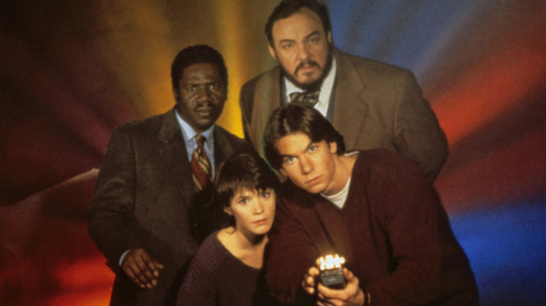 The cast of Sliders prepares for another slide.