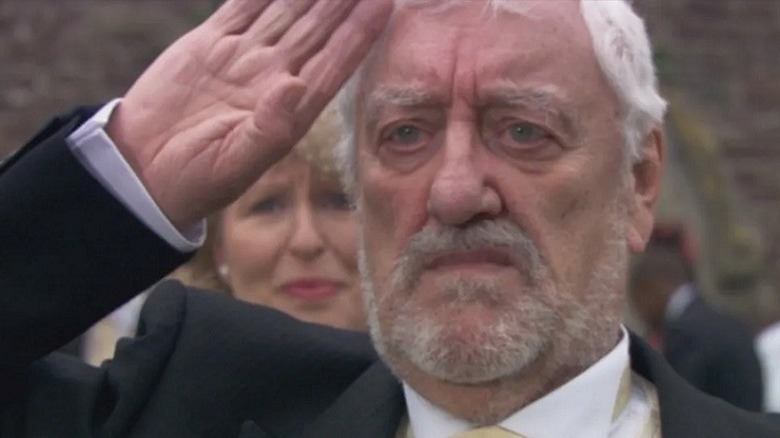 Bernard Cribbins saluting