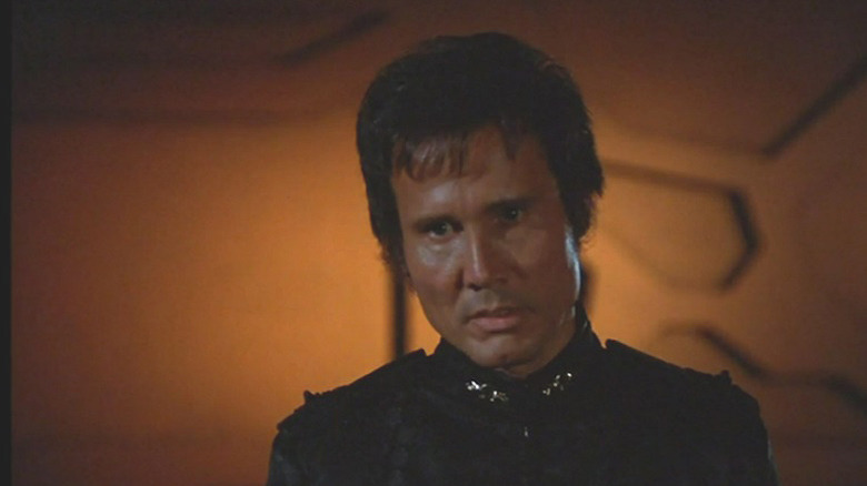 Henry Silva snarling