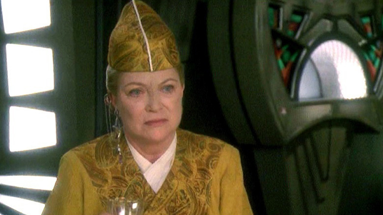 Louise Fletcher as Winn Adami