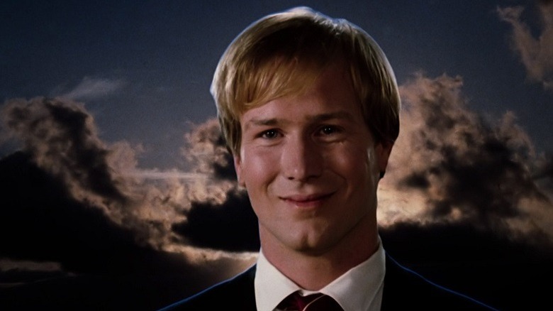 William Hurt in front of a cloudscape