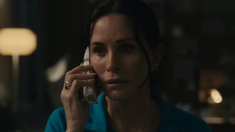 Courtney Cox talks on phone 