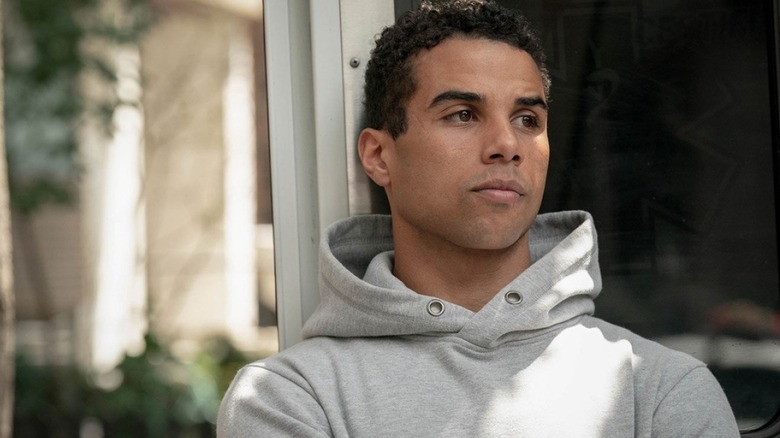 young man grey hoodie