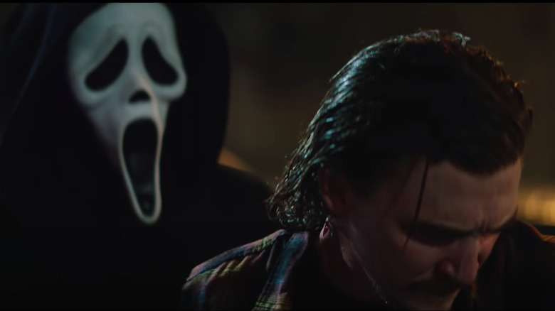 Ghostface and Kyle Gallner in Scream