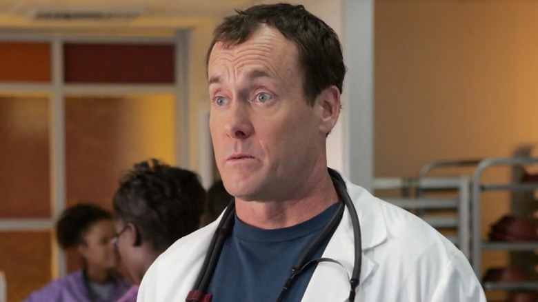 John C. McGinley as Dr. Cox looking surprised in Scrubs