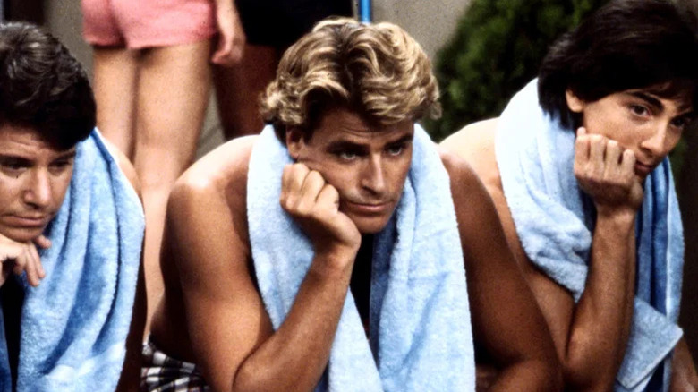 Ted McGinley as Roger Phillips on Happy Days, pouting while wearing a towel