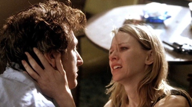 Naomi Watts holds Sean Penn