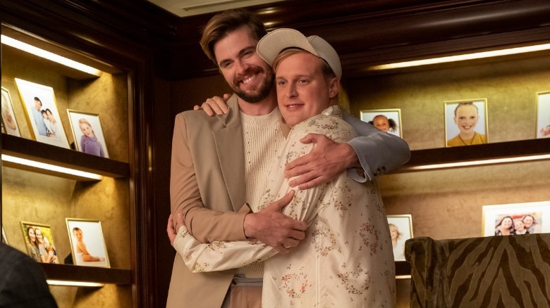 Marc and Elliott hug