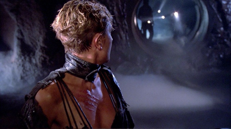Tasha Yar, looking over her shoulder as she is attacked by a gang of flashlights in the movie 