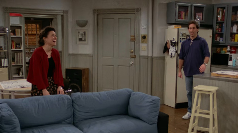 Elaine celebrating far from Jerry in Seinfeld