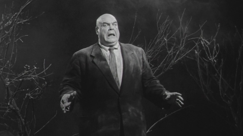 Unette of clay inspector wanders in the cemetery in plan 9 of outer space