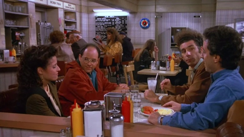 Seinfeld Jerry George Elaine Kramer in diner booth