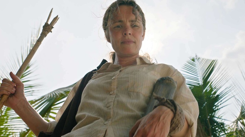 Linda Liddle, carrying a spear, in Send Help