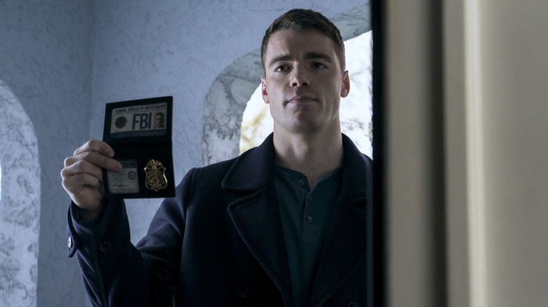 The Night Agent Peter flashing FBI badge