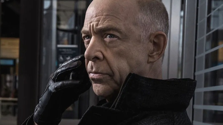Prime-Howard looks cold and calculating while receiving a call in Counterpart