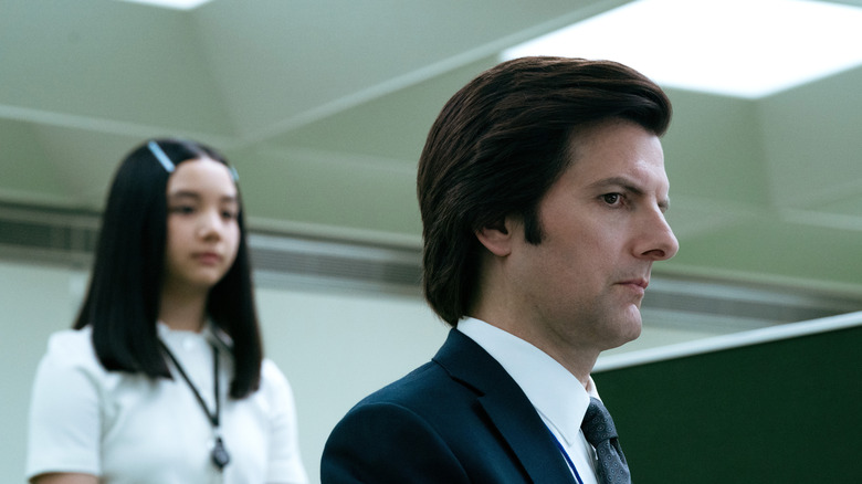 Miss Huang watching Mark S. as he works on an MDR file in Severance season 2