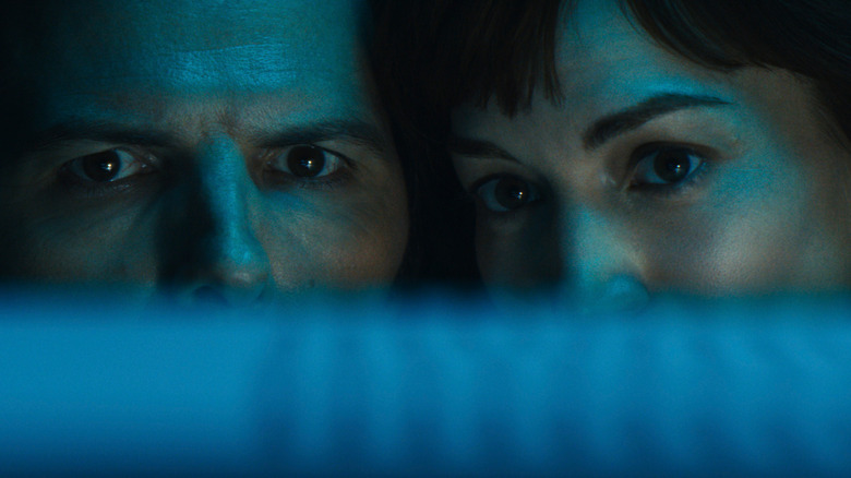 Mark and Gemma staring at the Cold Harbor file in Severance