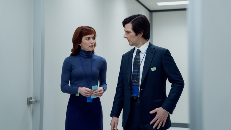 Helly R. and Mark S. talking in the hallway on Severance