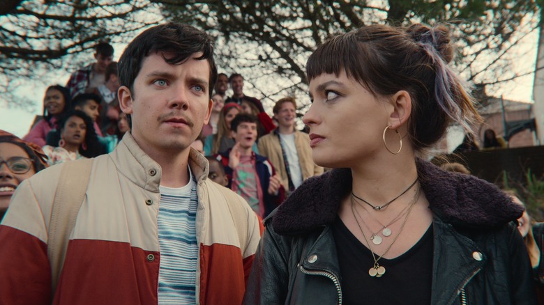 Asa Butterfield and Emma Mackey