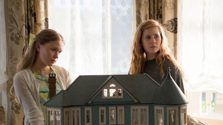 Amy Adams and Eliza Scanlen near doll house Sharp Objects