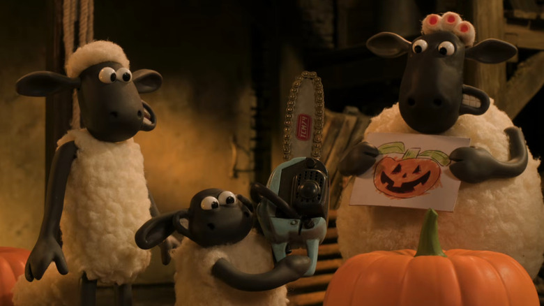 Timmy holding a chainsaw much to the horror of the other sheep in Shaun The Sheep: The Beast Of Mossy Bottom