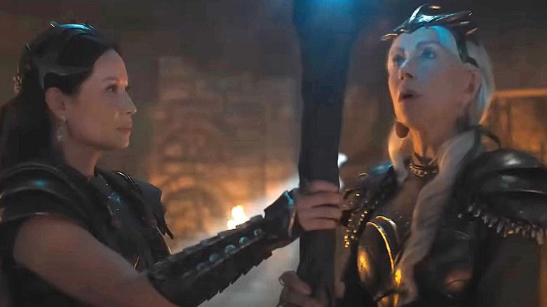 Kalypso and Hespera holding staff