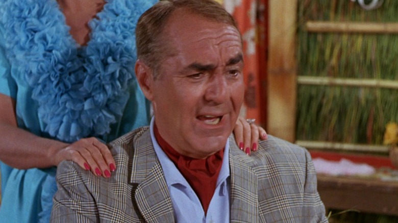 Mr. Howell getting a neck massage from Mrs. Howell on Gilligan's Island.