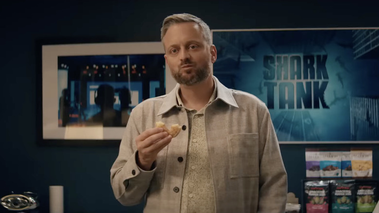 Nate Wilcox (Nate Bargatze) backstage during the Shark Tank sequence in The Breadwinner