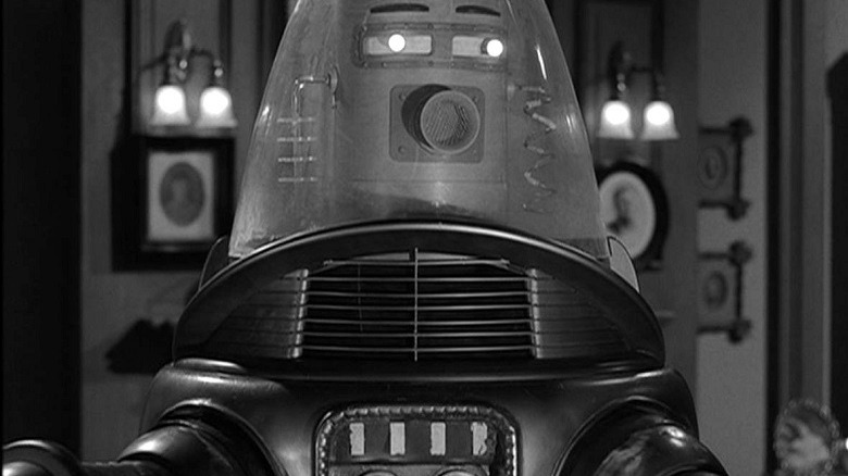 An old fashioned robot looks on 