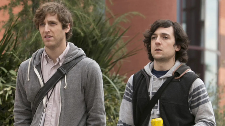Richard Hendricks (Thomas Middleditch) and Big Head (Josh Brener) walk outside in Silicon Valley