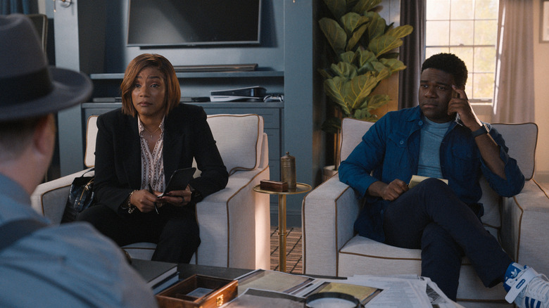 Danner and Aniq speak to a client in The Afterparty