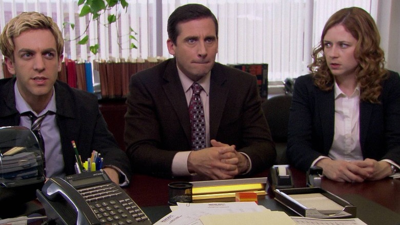 BJ Novak, Steve Carell, and Jenna Fischer as Ryan, Michael, and Pam in an accountant's office in The Office