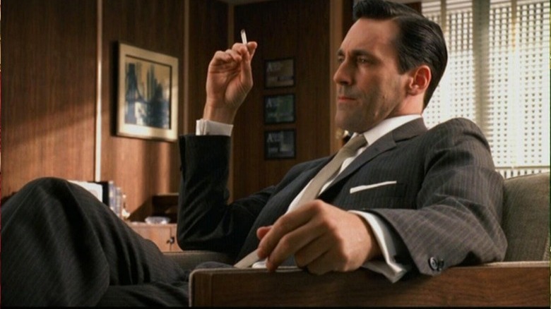 jon hamm as don draper smoking cigarette