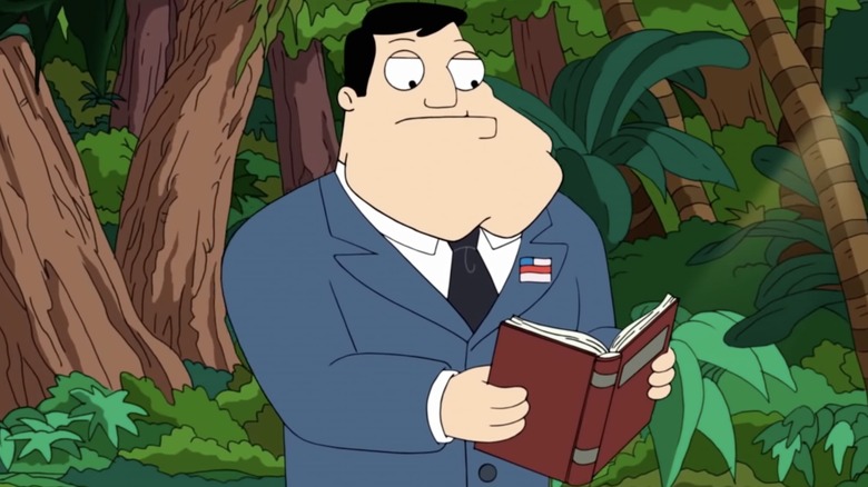 Stan Smith reading a book and looking confused