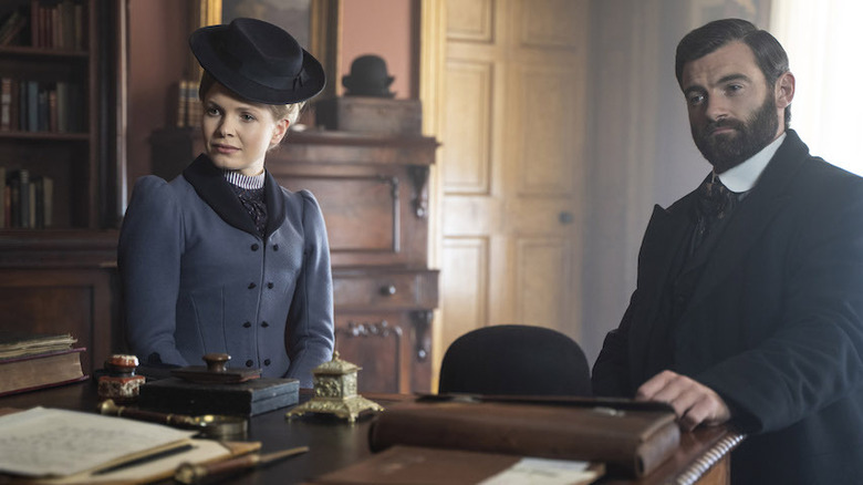 Miss Scarlet and the Duke at desk
